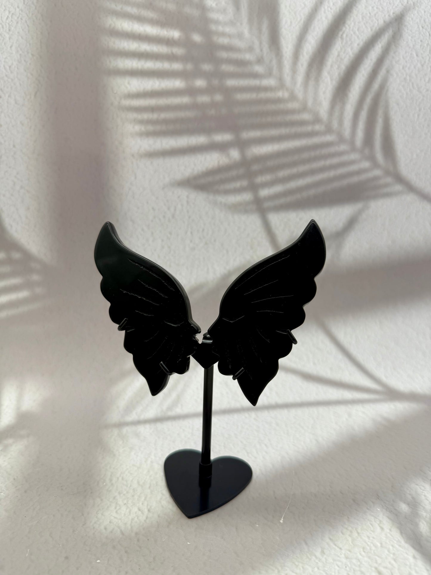 Küssende Gesichter auf Ständer