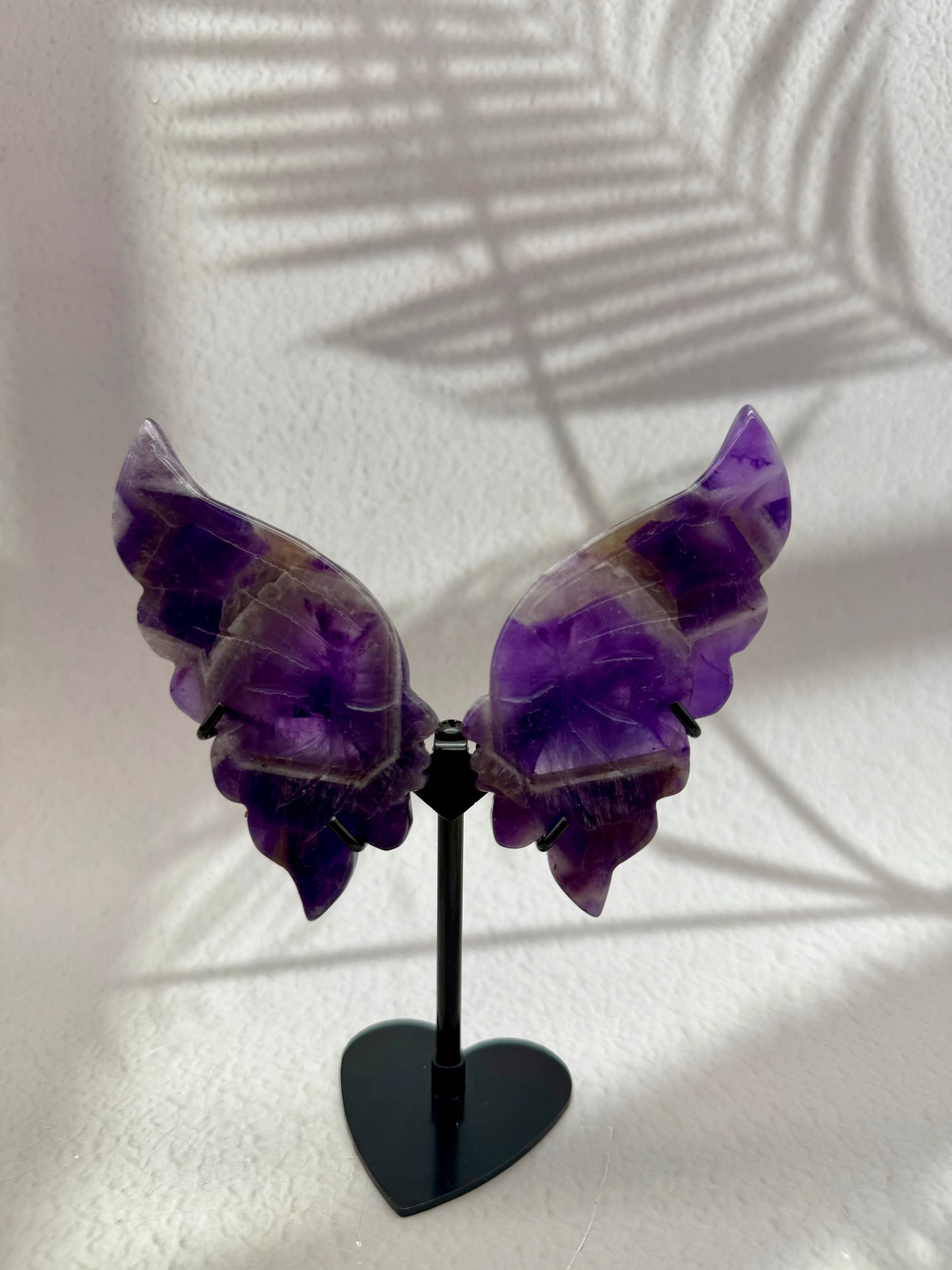 Küssende Gesichter auf Ständer